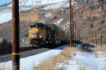 UP 8664, 9021, 7781 (SD70ACE, SD70ACE, C45ACCTE) lead an eastbound stack train through Echo Canyon Utah, February 19, 2022 {Winter Echofest}